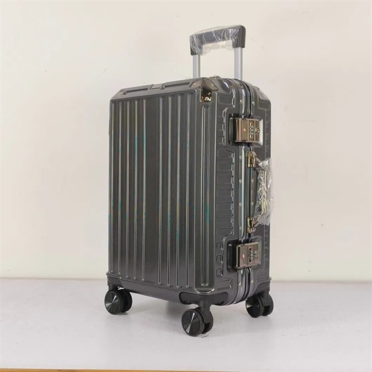 Bagagli in alluminio senza cerniera